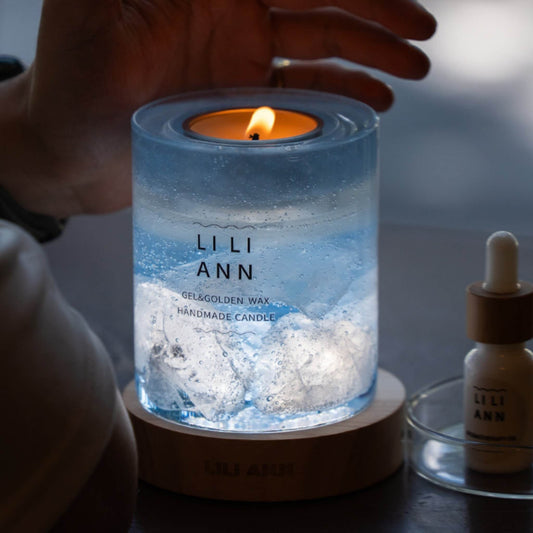 Holding The Gel Object .05 in low light. The flame illuminates the suspended ice structures, creating a cold, blue glow.