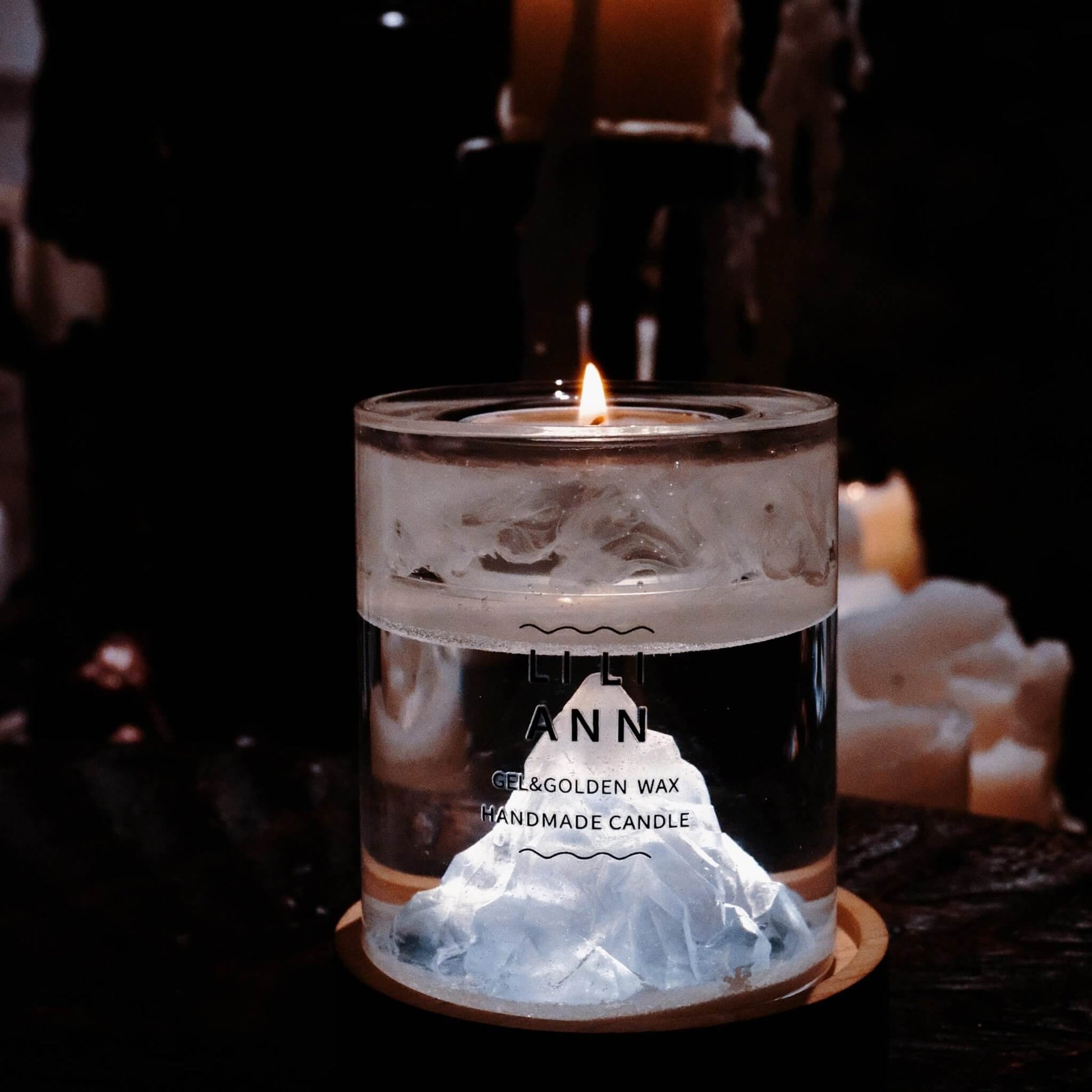 Illuminated Gel Object .06 in the dark. The internal snow mountain sculpture glows white, creating a serene winter atmosphere.