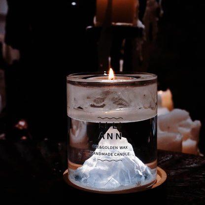 Illuminated Gel Object .06 in the dark. The internal snow mountain sculpture glows white, creating a serene winter atmosphere.