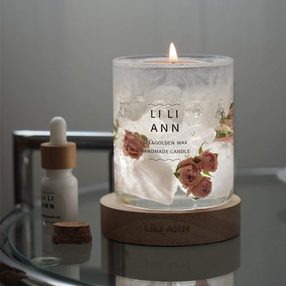 Close-up of preserved rose buds frozen in bubble-free clear gel with ice-like fissures.