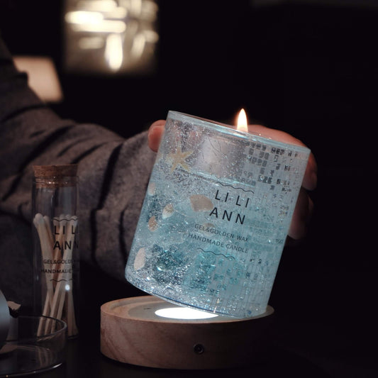 Holding The Gel Object .08 in the dark. The flame illuminates the suspended mosaic tiles, creating a shimmering underwater effect.