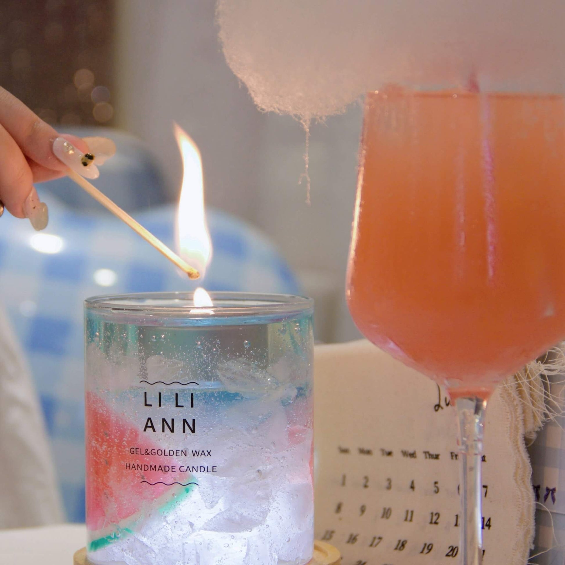 Liliann Gel Object .09 (Sorbet). Refillable candle vessel with translucent pink gel and watermelon textures, illuminated to glow like a summer cocktail.