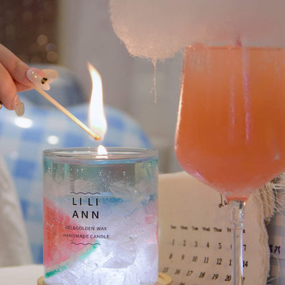 Liliann Gel Object .09 (Sorbet). Refillable candle vessel with translucent pink gel and watermelon textures, illuminated to glow like a summer cocktail.