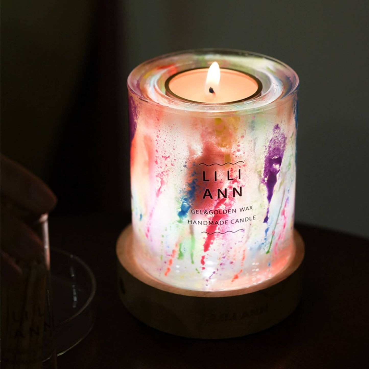 Illuminated Gel Object .05 showing neon pigments glowing in candlelight, creating a lava-lamp effect.