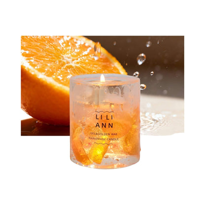 Object .16 Solar by LILIANN. A clear gel vessel containing translucent, sun-cured orange slices that glow like amber when lit.