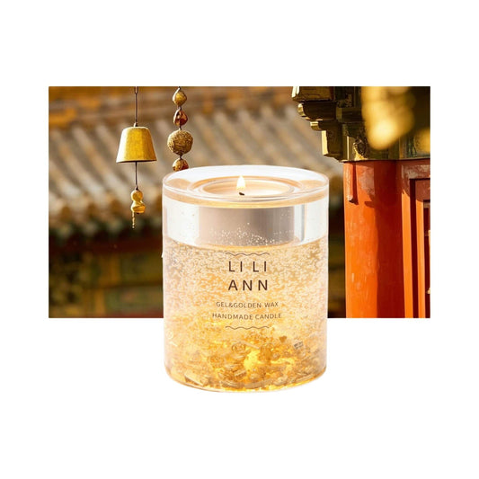 Object .18 Gilded by LILIANN. Gel candle filled with suspended gold flakes against an ancient golden temple background, symbolizing wealth and warmth.