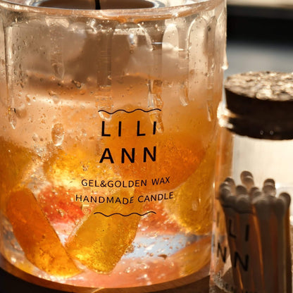 Close-up of The Solar Vessel showing water droplets on the glass and suspended fruit slice details.