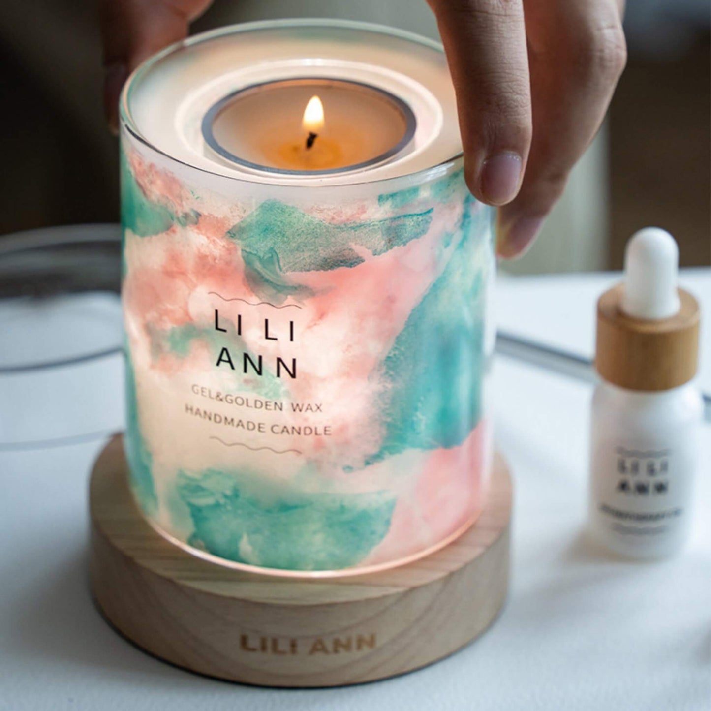 Illuminated Serene Vessel glowing with soft pink and green hues, resembling a Monet water lily painting.